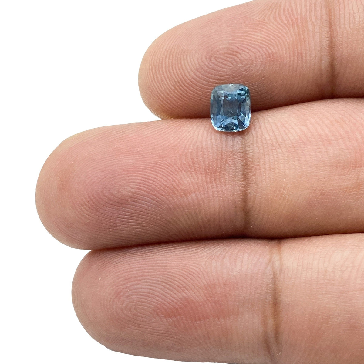 0.99ct | Brilliant Cut Cushion Shape Blue Montana Sapphire-Modern Rustic Diamond
