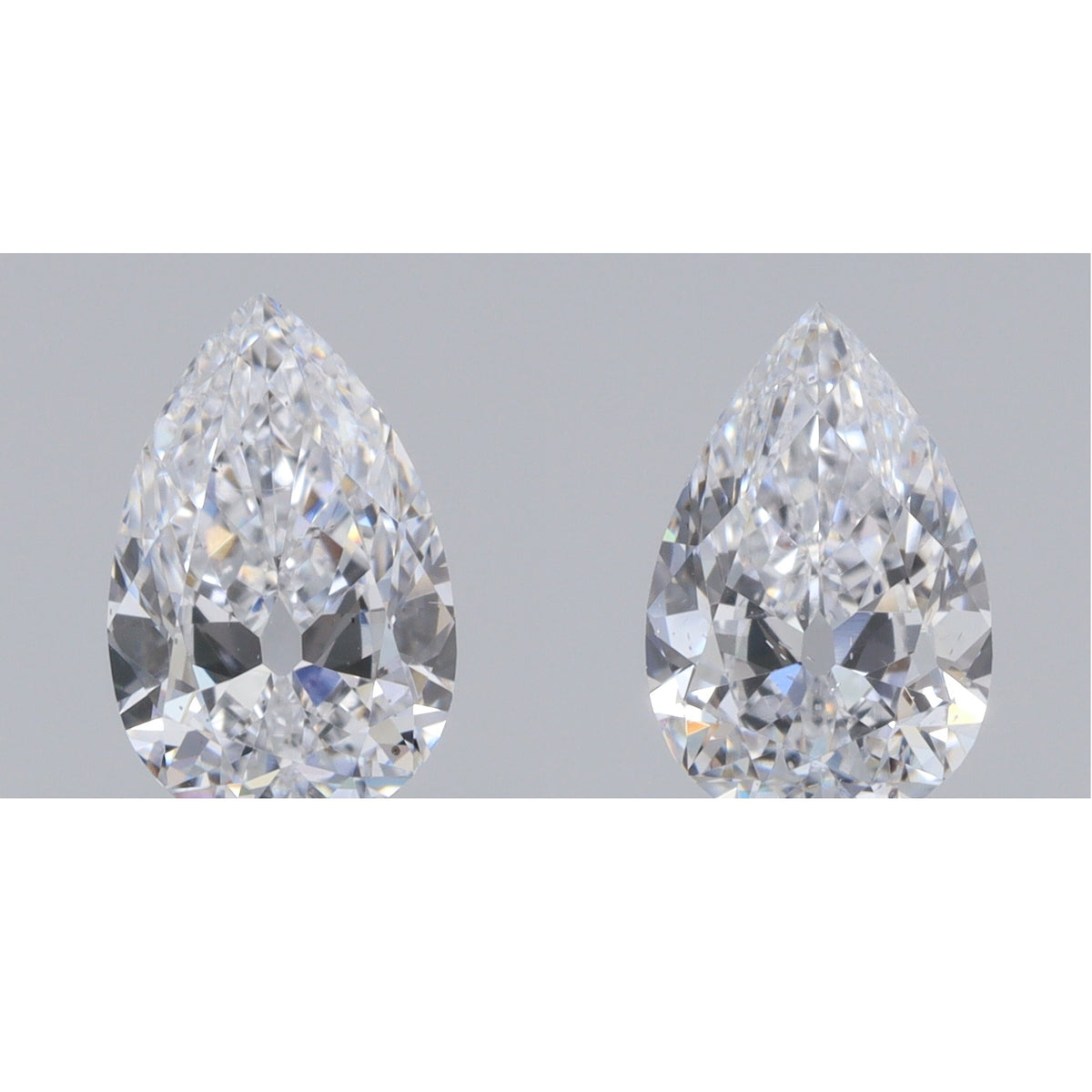 0.81cttw | F VS2 Pear Shape Old Mine Cut Diamond Matched Pair - Modern Rustic Diamond