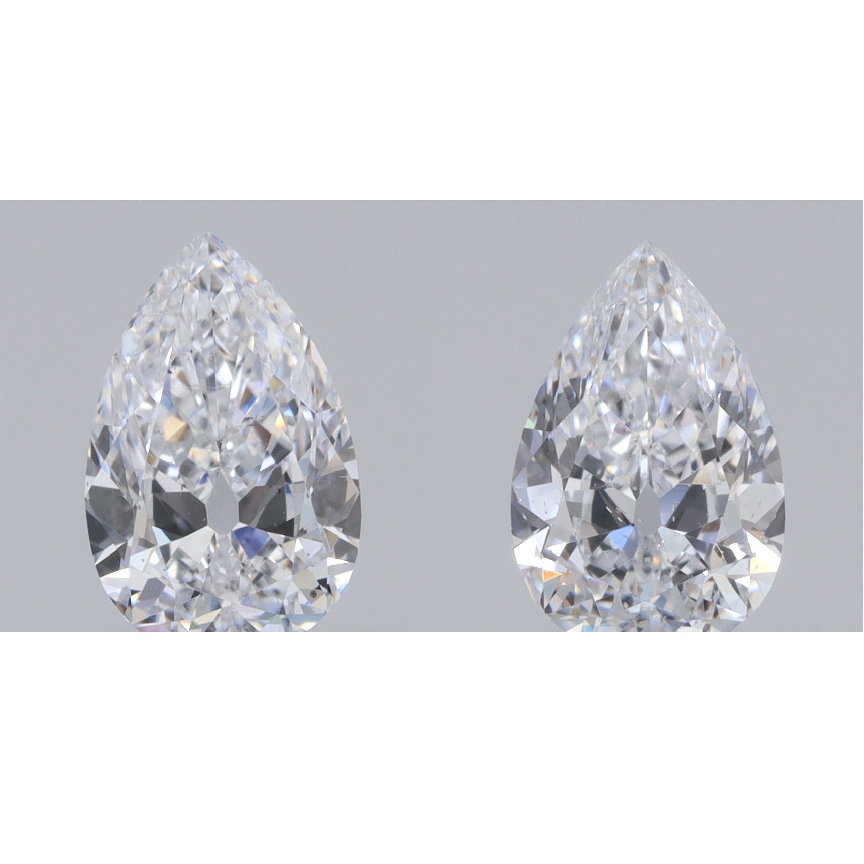 0.81cttw | F VS2 Pear Shape Old Mine Cut Diamond Matched Pair - Modern Rustic Diamond