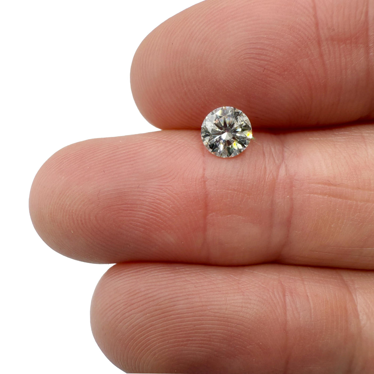 0.70ct | K/SI2 Round Shape Brilliant Cut Diamond (GIA) - Modern Rustic Diamond