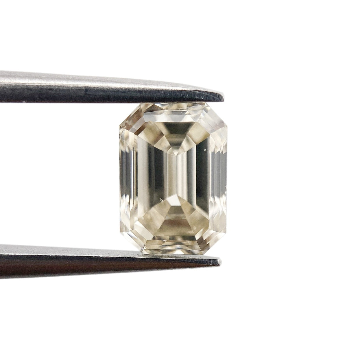 1.01ct | Champagne VVS Emerald Shape Step Cut Diamond - Modern Rustic Diamond