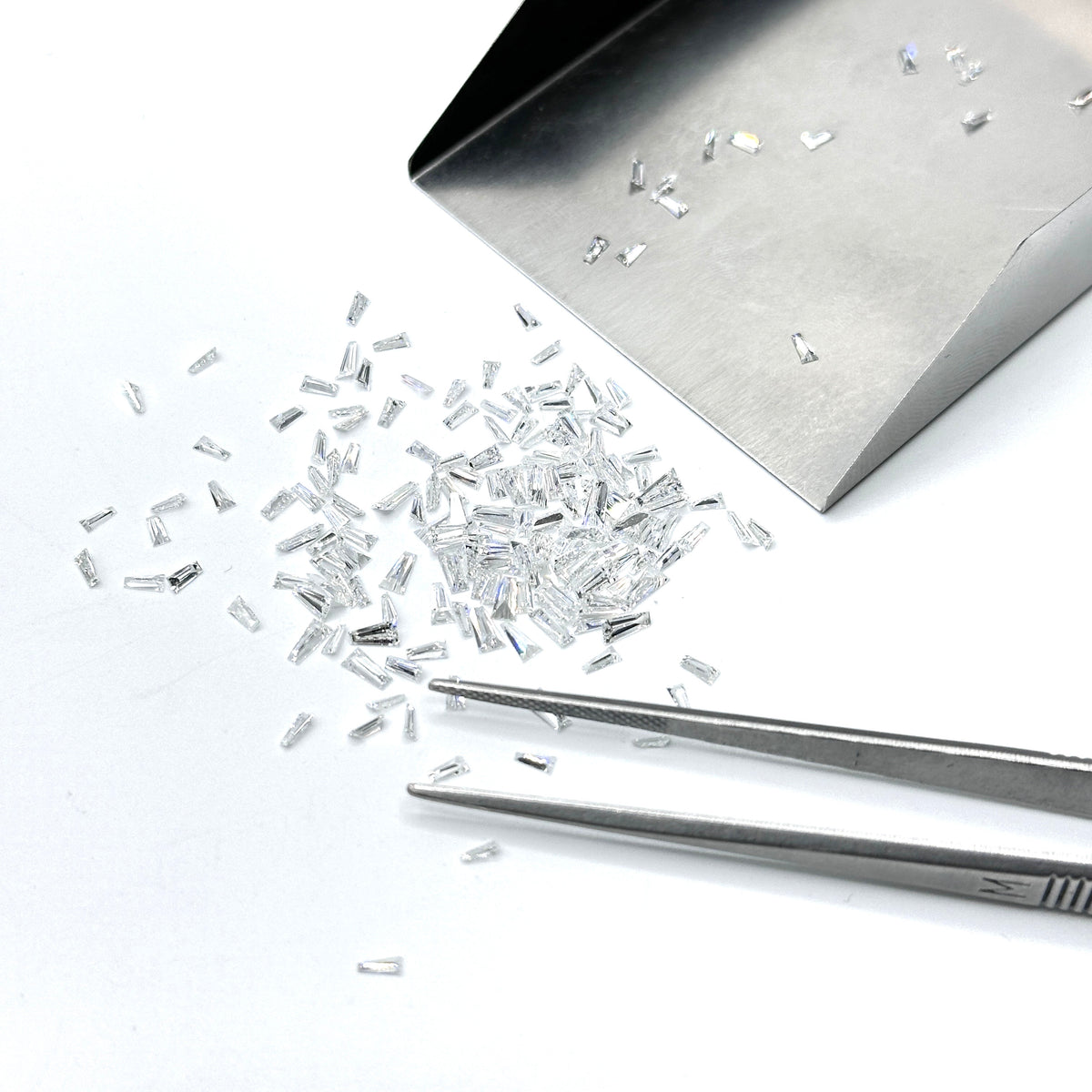 White Diamond Tapered Baguette Shape Melee