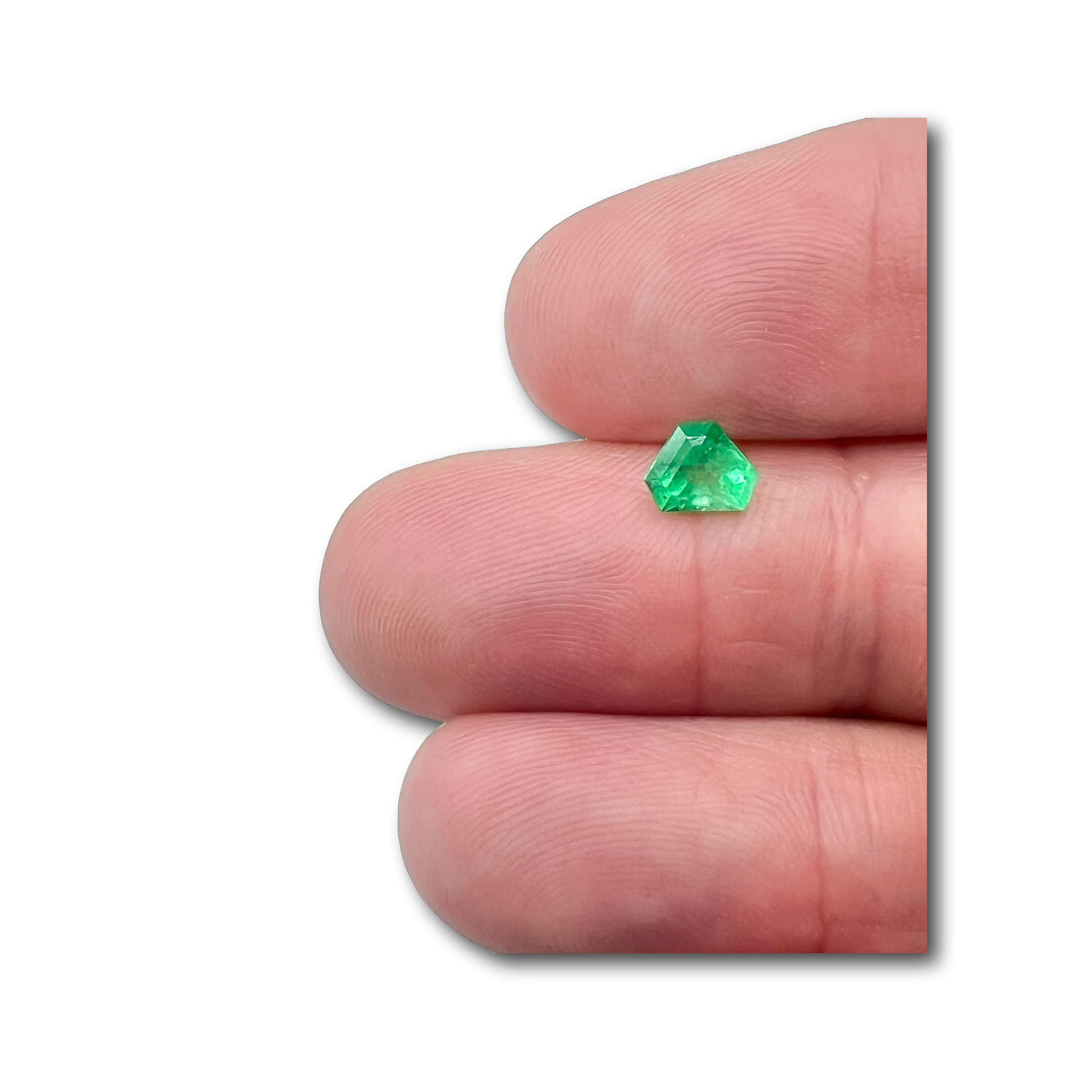 0.60ct | Step Cut Shield Shape Muzo Origin Emerald